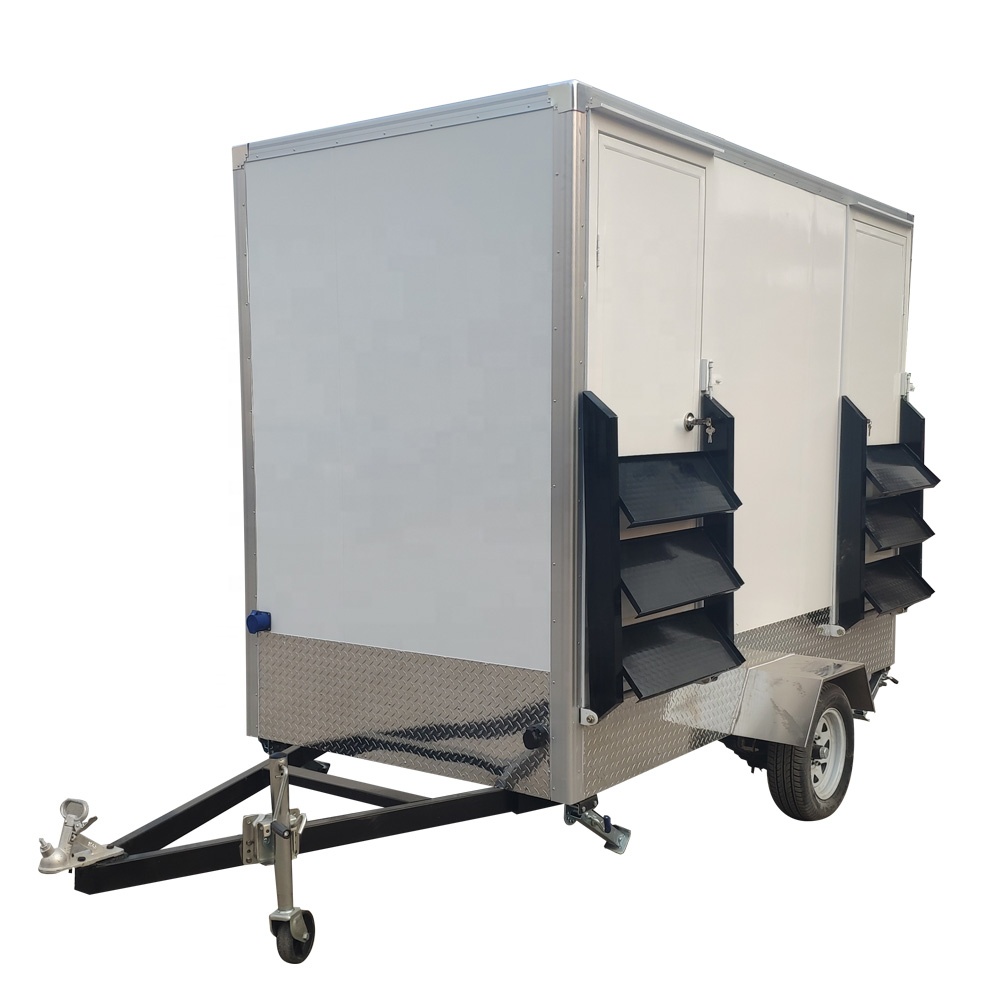 two  outdoor public bath room mobile toilet